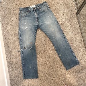 Distressed Levi’s 517 boot cut raw hem